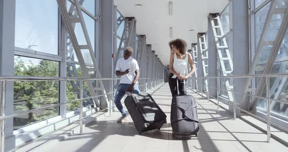 Couple of Foreign Students Happy To Arrive in New City, African American Guy and Curly Ethnic Woman