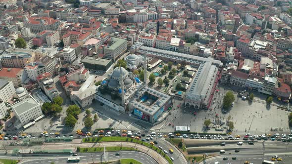 New Mosque Under Construction in Istanbul Next To Grand Bazaar with Car Traffic, Aerial Slide Right