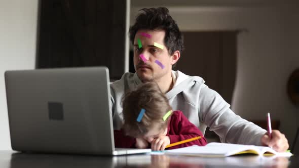 Father with a son try to work at home
