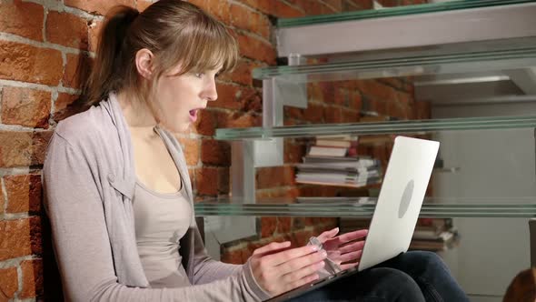 Angry Frustrated Woman Working on Laptop Sitting on Stairs