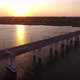 Aerial Shot of Picturesque Bridge Covering the Dnipro at Dreamy Sunset in Summer - VideoHive Item for Sale