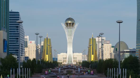 The City of Astana Timelapse Residents Are Walking and Relaxing on a Sunny Day Near the Symbol of
