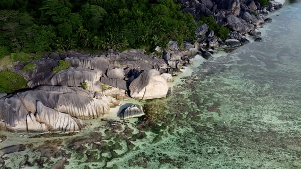 beach with large stones on the island of La Digue