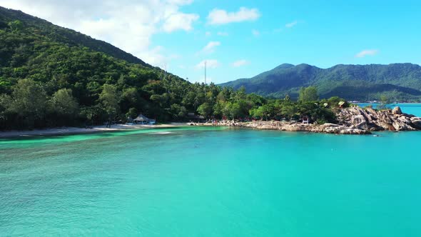 Aerial drone seascape of paradise shore beach adventure by turquoise ocean and clean sandy backgroun