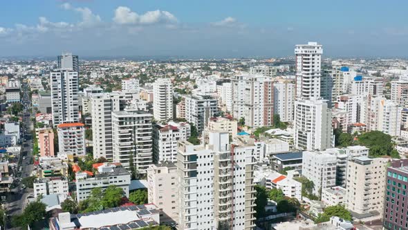 Skyscrapers of Santo Domingo neighborhood, Dominican Republic. Aerial forward