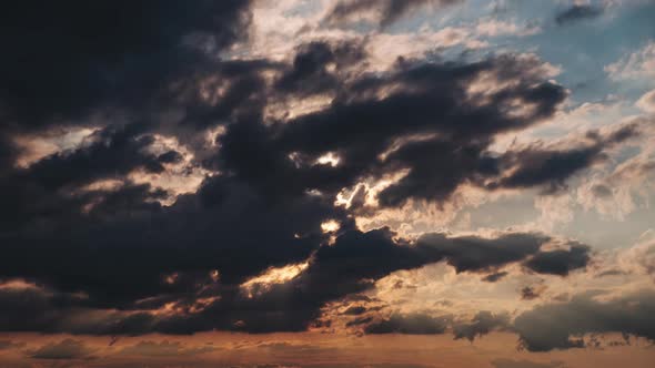 Amazing Sunset Through the Layers Clouds in the Orange Sky Majestic Timelapse