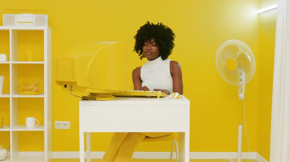 Black Woman Has Fun Retro Office