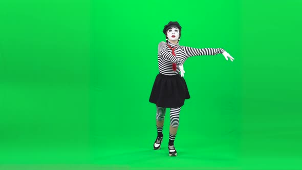 Mime Girl Is Skating on Ice. Chroma Key. Full Length.