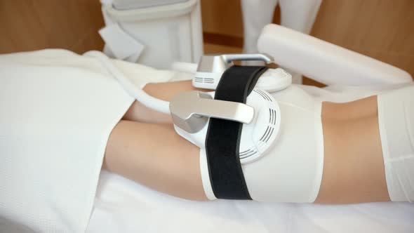 Emt Heads Placed on Woman's Booty Body Contouring Treatment at the Treatment Center