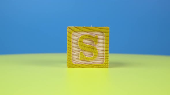 Close up shot letter "S" alphabet wooden block