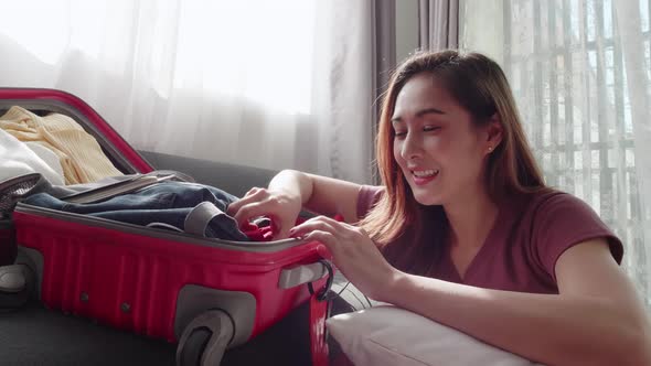 Woman serious checking before traveling the new normal travel need a face mask