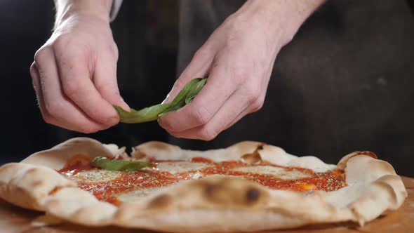 Cooking Traditional Vegetarian Pizza in Italian Pizzeria