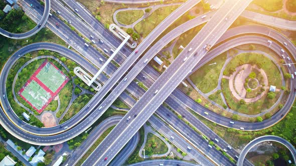 4K : Aerial Hyper lapse drone view of road junction with moving cars.