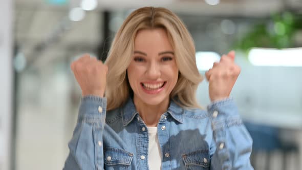 Excited Young Casual Woman Celebrating Success, Cheering