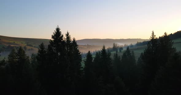 Fog In The Carpathian Mountains. Sunrise Over The Mountains