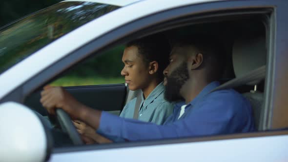 Curious Father Trying to Read Son Phone Message, Care of Child, Family Relations