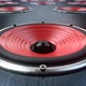 A lot of Audio Speakers with Red Membranes Playing Modern Music Synchronously - VideoHive Item for Sale
