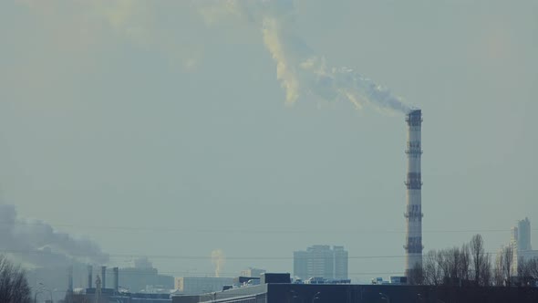 Emission Atmosphere From Industrial Pipes Smog. Industrial Zone Smokestack Exhaust Pipe.