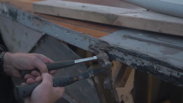 Carpenter res rotten piece of gunwale on eighty year old Seaplane Tender wooden boat