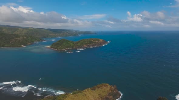 Seascape with Tropical Island, Rocks and Waves. Catanduanes, Philippines