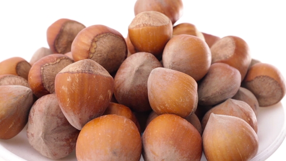 A Pile Of Shelled Hazelnuts Rotating Smoothly