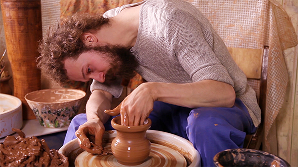 Craftsman Making a Clay Vase