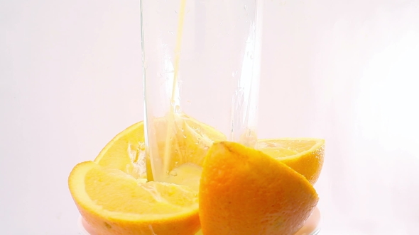 Orange Juice Rotating On White Background