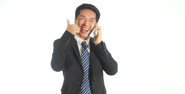 Happy Asian Businessman on Phone