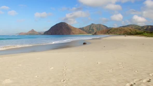 Cinematic aerial view of a tropical beach, Lombok, Indonesia.