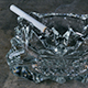 In a Glass Ashtray Smoking a Lit Cigarette - VideoHive Item for Sale