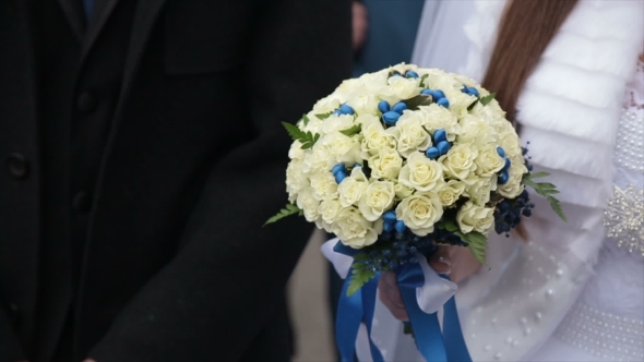 Brides Bouquet On Hands