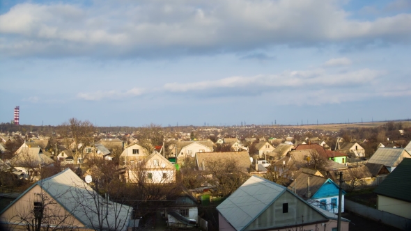 Clouds In The Sky Moving Over The Houses In The City alt