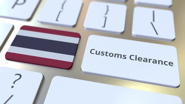 CUSTOMS CLEARANCE Text and Flag of Thailand on the Keyboard