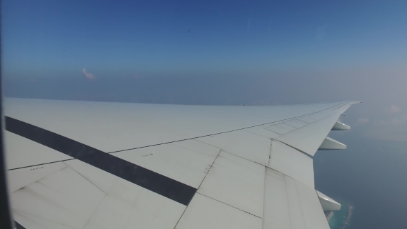 Wing Of Airplane Flying In Blue Sky 11 alt