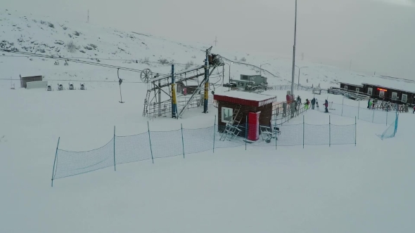 Flying Over Ski Lift On Winter Resort