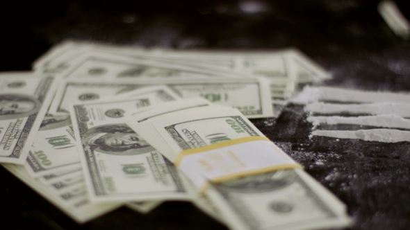Cocaine Snorted On The Table With Dollar