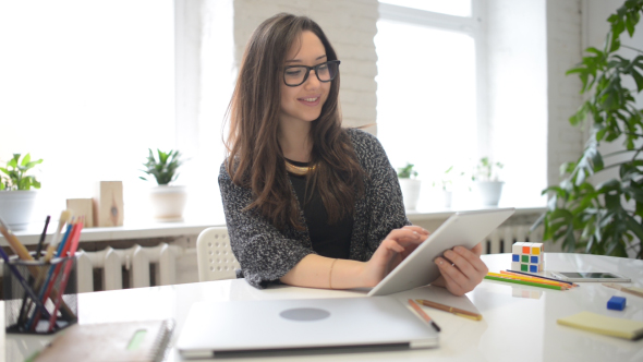 Girl Working on Tablet, Positive Emotions alt