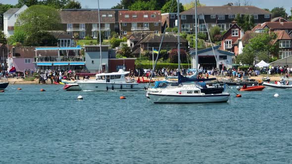 Yachts, Speedboats and Vessels on a River in the Summer