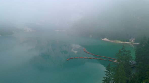 Beautiful Landscape of Braies Lake Lago Di Braies Romantic Place with Wooden Bridge and Boats on the