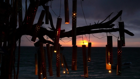 Romantic Lanterns On Beach At Sunset