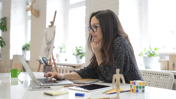 Working Relax Designer in Creative Agency Office alt