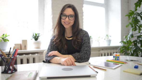 Beautiful Smiling Girl, Female Designer in Office