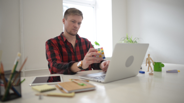 Designer Thinking, While Looking at Rubik Cube