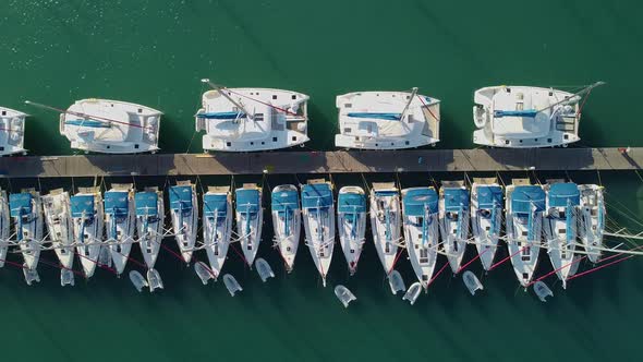 A Flight Over the Pier with Yachts