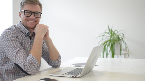 Portrait Of Smiling young Designer, Businessman