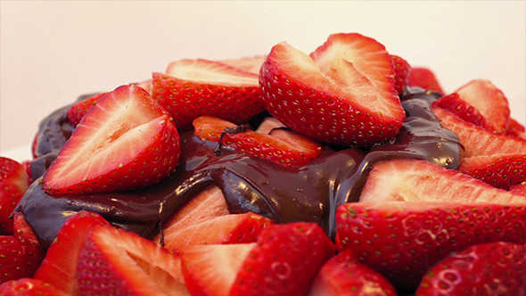 Strawberries And Melted Chocolate Rotating