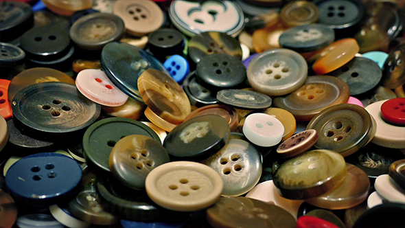 Mixed Buttons Poured Into Pile