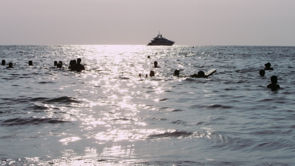 People Swimming In The Ocean