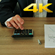 Businessman Checks the Calculations on a Calculator  - VideoHive Item for Sale