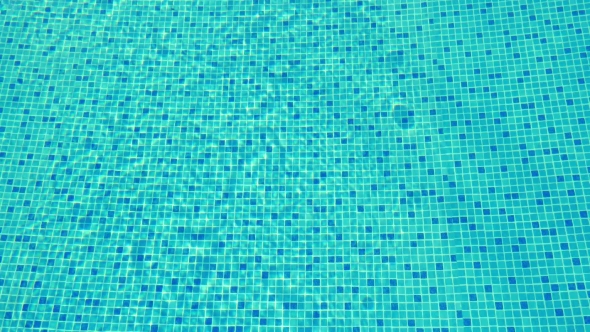 Clear Water In Blue Tiled Pool